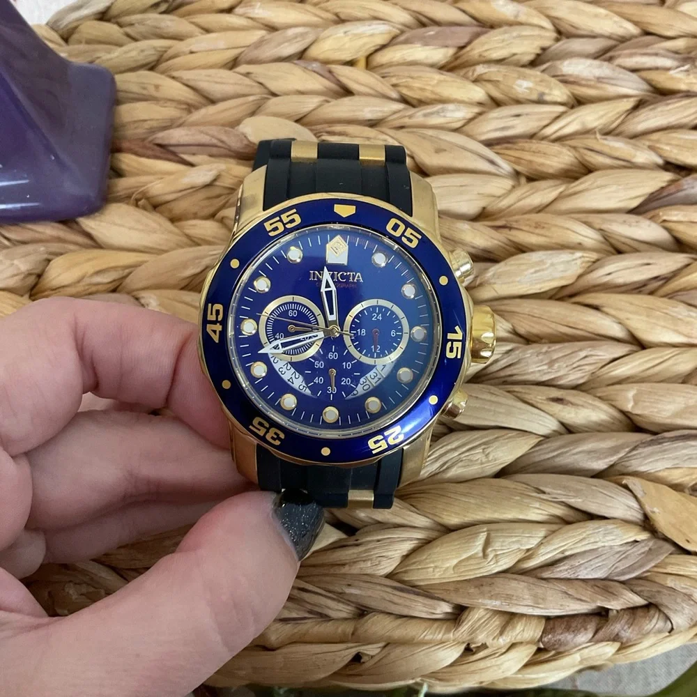 Invicta Pro Diver Collection Model 6983 Men’s Wristwatch 48mm Blue & Gold